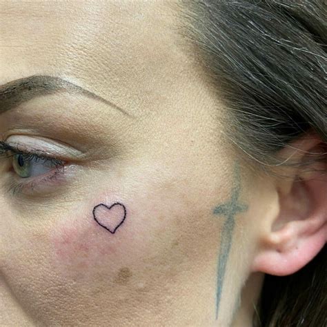 Heart Face Tattoo